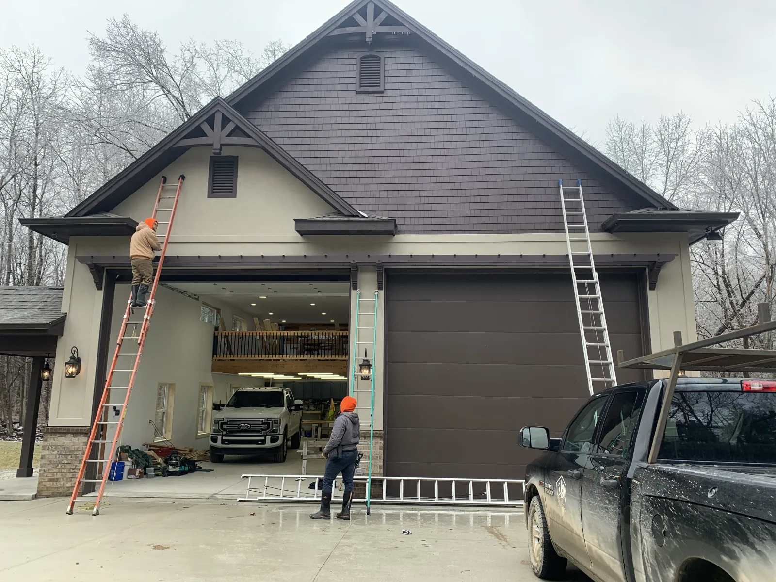 Anchor Siding LLC crew at work on a Michigan home exterior
