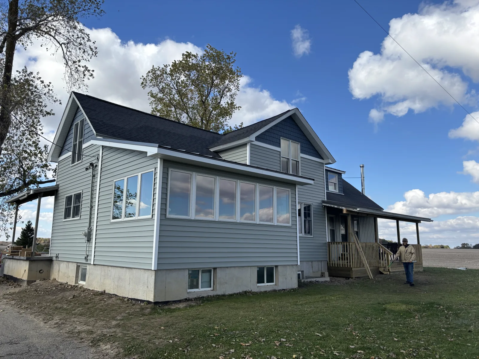 Modern blue home, complete - real Anchor Siding LLC job in mid-Michigan